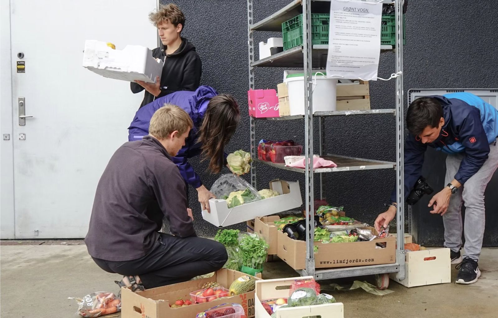 Collecting surplus vegetables from a supermarket’s green cart